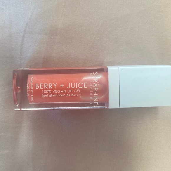 6/$40 or 9/$50 Seraphine Botanicals Berry + Juice Vegan Lip Gloss “Dainty Peach” - Picture 2 of 3